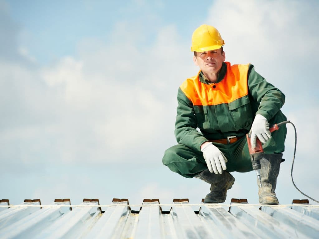 Roofer Fixating Metal Roof in Fort Lauderdale FL