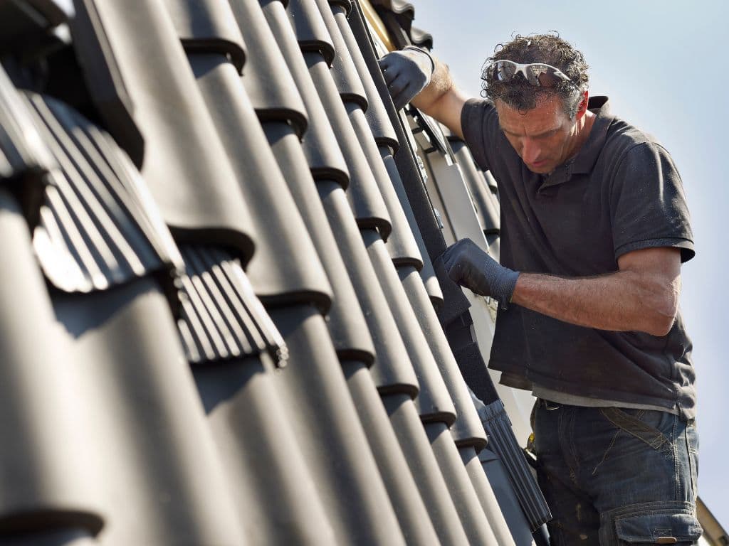 Roofers Inspecting Metal Roof Before Installing Fort Lauderdale
